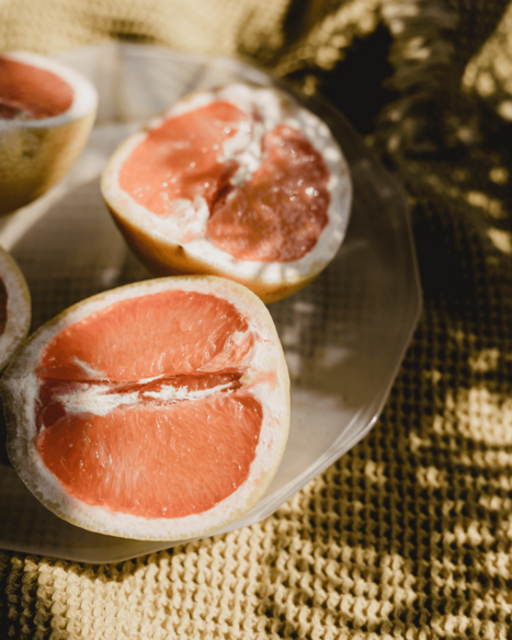 Zitrusfruechte aufgeschnittene Grapefruit